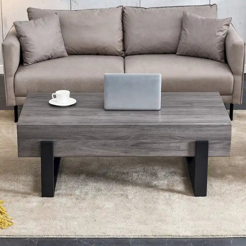 A Rustic Gray Wood Grain MDF Coffee Table With Black Metal Legs - An Elegant Space In Natural Wood Tones